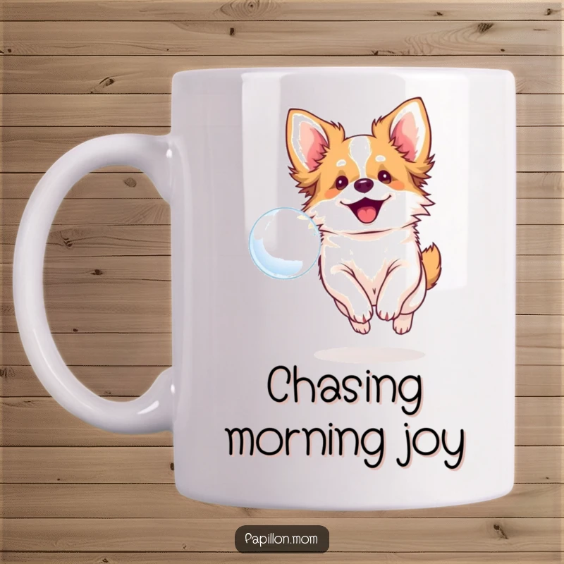 Funny mug with a smiling Papillon dog joyfully chasing a floating bubble, embodying playful canine energy.