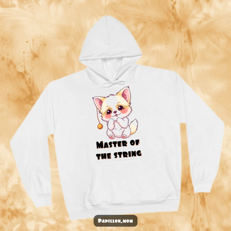 Funny Papillon hoodie depicting a cute dog energetically batting at a loose string, capturing its playful and joyful spirit.