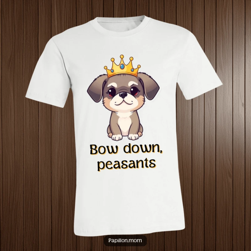 Funny T-Shirt: A dog wears a tiny crown, looking both regal and playfully mischievous, exuding royal charm.