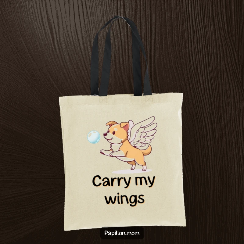 Funny tote bag showcasing a dog with prominent wings, playfully chasing a floating bubble, perfect for carrying essentials with a smile.